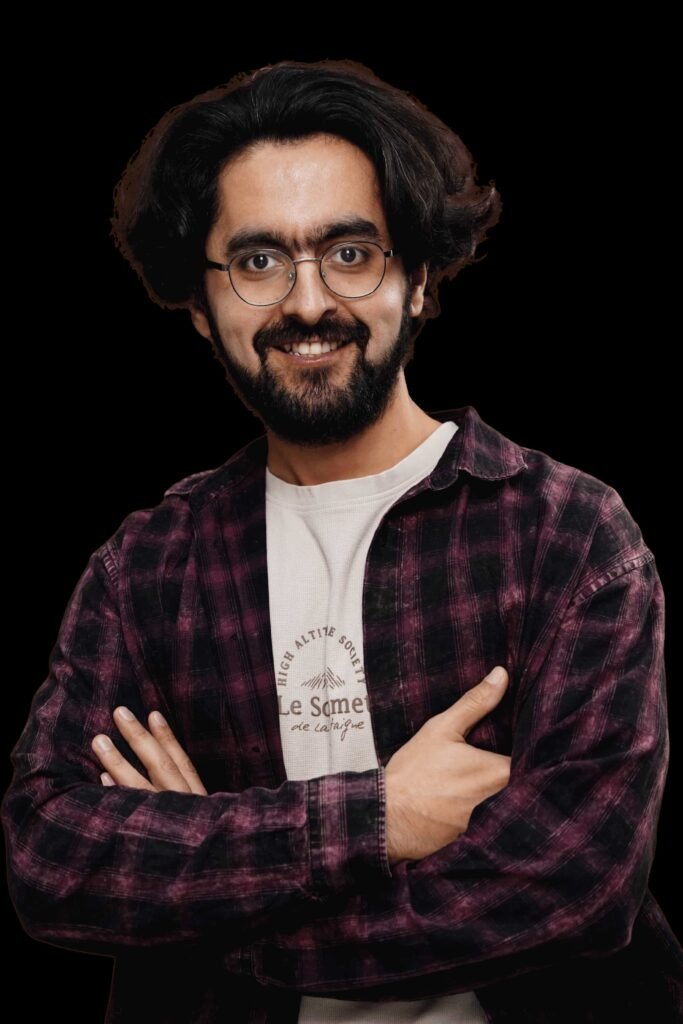Sanjar Hoshimi smiling and looking on the camera